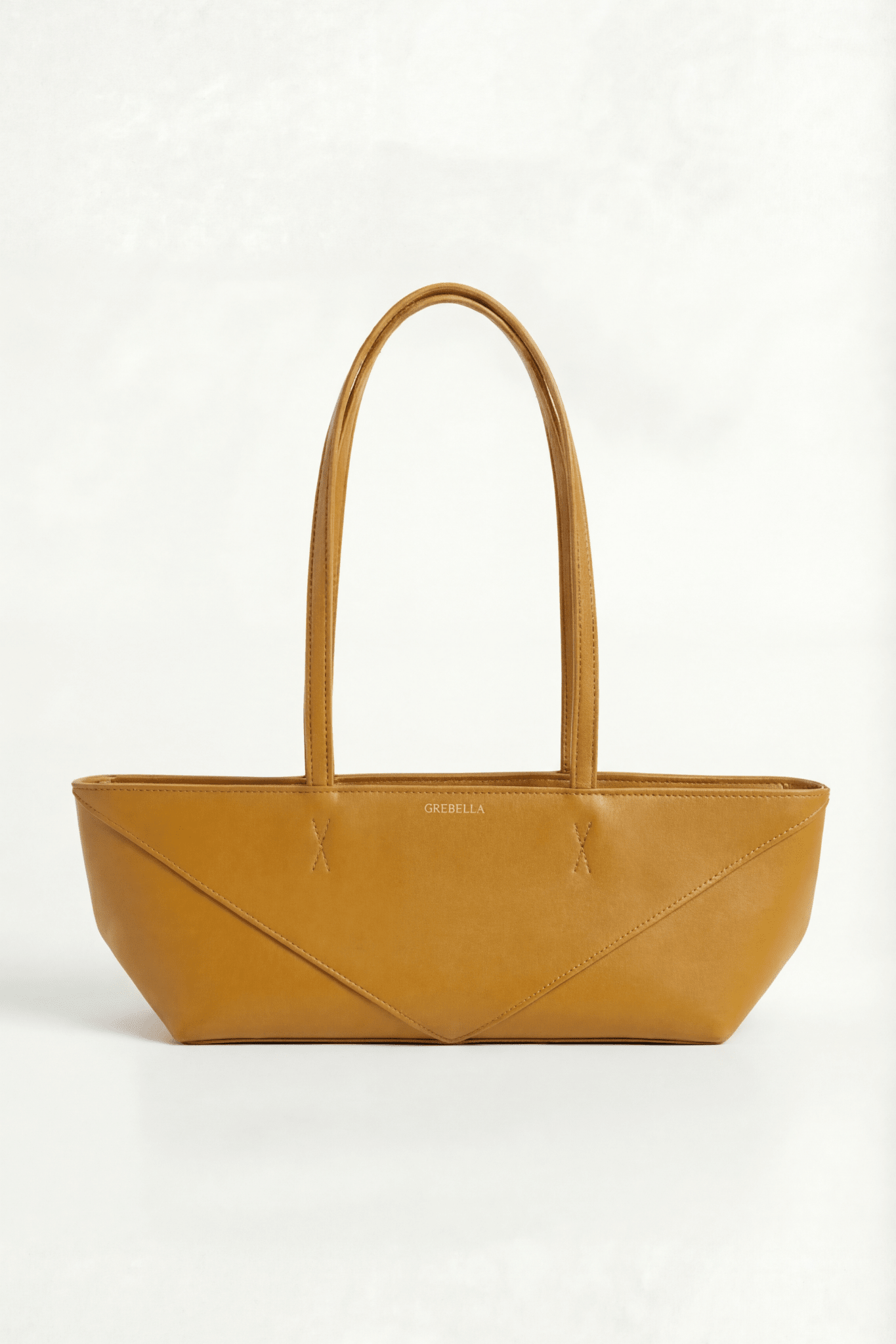 LÍNEA Saffron Pedrera matte leather micro bag by GREBELLA, Barcelona